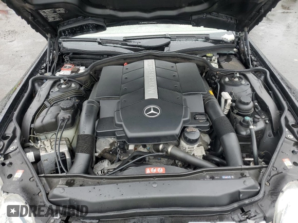 2005 Mercedes-Benz SL 500 z VIN WDBSK75FX5F101381, wystawiony jako Copart lot #57725655 z przebiegiem 45 705 mil mil oraz Szkoda całkowita • Salvage title. Historia ofert i sprzedaży dostępna na DreamBid. Obrazek 11.