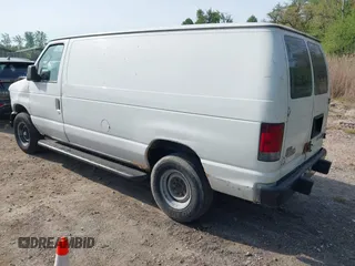 2009 Ford Econoline Cargo with VIN 1FTNE24W89DA31505, listed as a IAAI auction lot 42066233 with 267,327 mi miles. Bid and sale history available at carsss.com. Image 3.