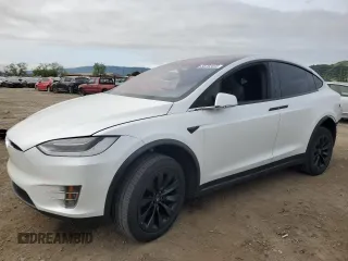 2018 Tesla Model X 75D with VIN 5YJXCAE28JF138300, listed as a Copart auction lot 50762405 with 135,527 mi miles and Salvage Title. Bid and sale history available at carsss.com. Image 1.