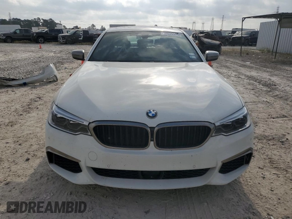 2018 BMW 5 Series M550i xDrive with VIN WBAJB9C58JG464461, listed as a Copart auction lot 53626575 with 62,436 mi miles and Salvage Title. Bid and sale history available at carsss.com. Image 5.