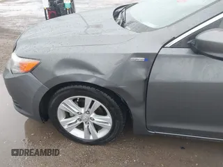 2014 Acura ILX Hybrid Technology z VIN 19VDE3F75EE300312, wystawiony jako IAAI lot #41608572 z przebiegiem 126 974 mil mil oraz . Historia ofert i sprzedaży dostępna na DreamBid. Obrazek 18.