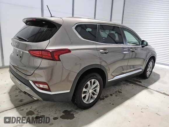 2019 Hyundai Santa Fe SE z VIN 5NMS23ADXKH084868, wystawiony jako Copart lot #60261855 z przebiegiem 137 843 mil mil oraz Czysty tytuł • Clean title. Historia ofert i sprzedaży dostępna na DreamBid. Obrazek 3.