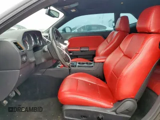 2013 Dodge Challenger R/T z VIN 2C3CDYBT3DH670283, wystawiony jako Copart lot #57818395 z przebiegiem 93 439 mil mil oraz Czysty tytuł • Clean title. Historia ofert i sprzedaży dostępna na DreamBid. Obrazek 7.