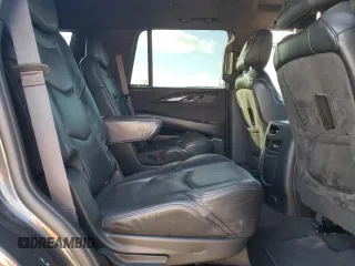 2015 Cadillac Escalade Platinum z VIN 1GYS4PKJ9FR643540, wystawiony jako Copart lot #80931014 z przebiegiem 156 820 mil mil oraz Szkoda całkowita • Salvage title. Historia ofert i sprzedaży dostępna na DreamBid. Obrazek 11.