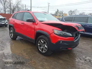 2019 Jeep Cherokee Trailhawk z VIN 1C4PJMBX4KD121168, wystawiony jako IAAI lot #41680398 z przebiegiem 128 931 mil mil oraz . Historia ofert i sprzedaży dostępna na DreamBid. Obrazek 1.