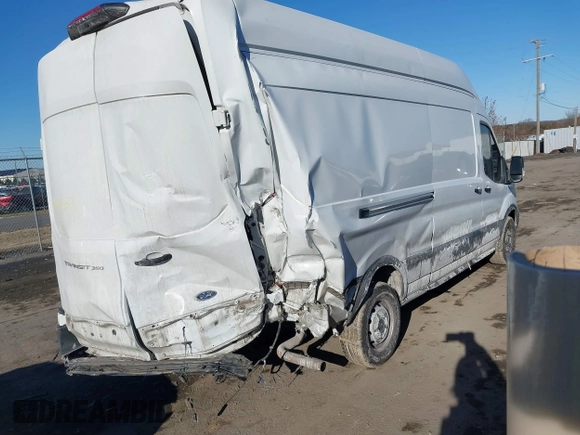 2021 Ford Transit Cargo with VIN 1FTBW3X82MKA14027, listed as a IAAI auction lot 41423524 with 121,221 mi miles. Bid and sale history available at carsss.com. Image 4.