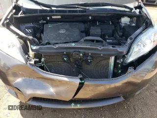 2013 Toyota Sienna XLE with VIN 5TDDK3DC1DS056128, listed as a Copart auction lot 65143524 with 64,132 mi miles and Salvage title. Bid and sale history available at DreamBid. Image 12.