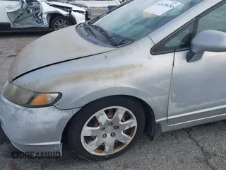 2006 Honda Civic LX with VIN 1HGFA165X6L144003, listed as a IAAI auction lot 42115624 with 310,261 mi miles and . Bid and sale history available at DreamBid. Image 13.