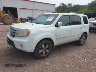 2011 Honda Pilot EX-L with VIN 5FNYF3H64BB027265, listed as a IAAI auction lot 41901424 with 198,556 mi miles and . Bid and sale history available at DreamBid. Image 2.