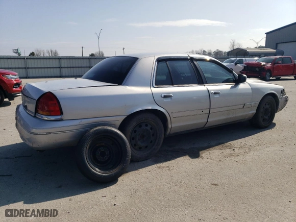 2003 Ford Police Interceptor Police Prep Pkg with VIN 2FAFP71WX3X110275, listed as a Copart auction lot 44157665 with 275,661 mi miles and Salvage Title. Bid and sale history available at carsss.com. Image 3.