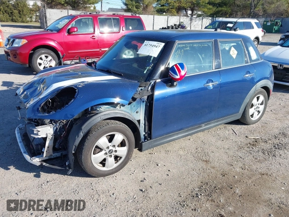 2016 MINI Hardtop 4 Door z VIN WMWXU1C54G2D09582, wystawiony jako IAAI lot #41754947 z przebiegiem 113 405 mil mil oraz . Historia ofert i sprzedaży dostępna na DreamBid. Obrazek 2.