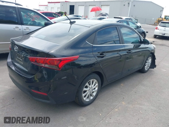 2021 Hyundai Accent SE with VIN 3KPC24A63ME148528, listed as a IAAI auction lot 42426884 with 23,429 mi miles and . Bid and sale history available at DreamBid. Image 4.