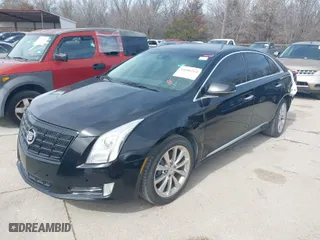 2013 Cadillac XTS Luxury with VIN 2G61R5S34D9135026, listed as a IAAI auction lot 41686214 with 92,732 mi miles. Bid and sale history available at carsss.com. Image 2.