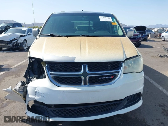 2013 Dodge Grand Caravan SXT with VIN 2C4RDGCG3DR600651, listed as a IAAI auction lot 41947769 with 201,824 mi miles and . Bid and sale history available at DreamBid. Image 12.