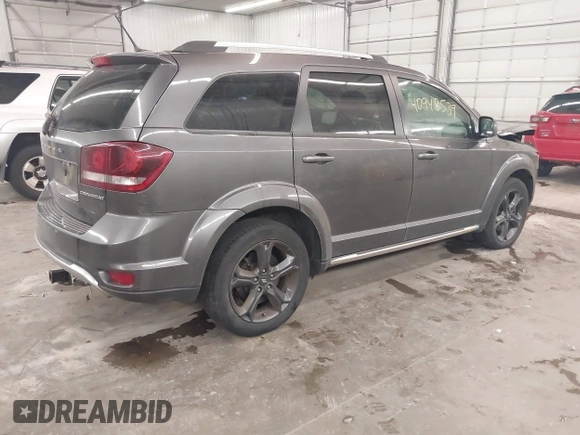 2018 Dodge Journey Crossroad with VIN 3C4PDDGG4JT388786, listed as a IAAI auction lot 40948539 with 122,449 mi miles. Bid and sale history available at carsss.com. Image 4.
