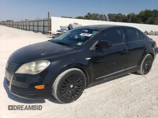 2011 Suzuki Kizashi SE z VIN JS2RE9A34B6111601, wystawiony jako Copart lot #75945784 z przebiegiem 128 926 mil mil oraz Szkody całkowita. Historia ofert i sprzedaży dostępna na DreamBid. Obrazek 1.