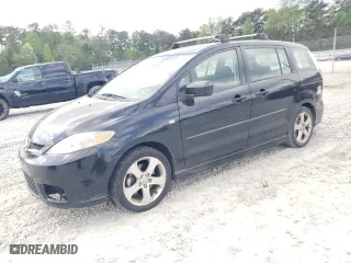 2006 Mazda Mazda5 Sport with VIN JM1CR293360125644, listed as a Copart auction lot 51659235 with 128,532 mi miles and Salvage Title. Bid and sale history available at carsss.com. Image 1.