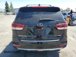 2016 Kia Sorento SXL z VIN 5XYPKDA19GG016449, wystawiony jako Copart lot #56943845 z przebiegiem 72 350 mil mil oraz Szkoda całkowita • Salvage title. Historia ofert i sprzedaży dostępna na DreamBid. Obrazek 6.