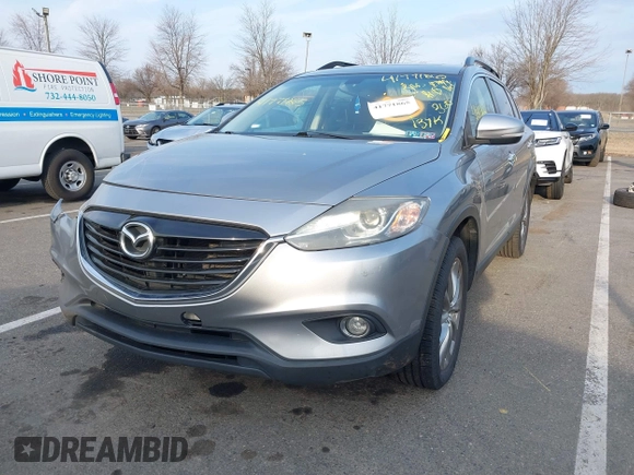 2015 Mazda CX-9 Grand Touring with VIN JM3TB3DA6F0447184, listed as a IAAI auction lot 41771865 with 137,814 mi miles. Bid and sale history available at carsss.com. Image 17.
