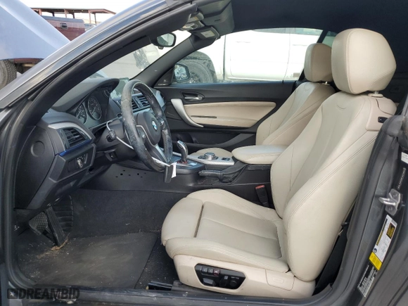 2015 BMW 2 Series 228i with VIN WBA1K5C5XFV473884, listed as a Copart auction lot 77896644 with 76,419 mi miles and Salvage Title. Bid and sale history available at carsss.com. Image 7.