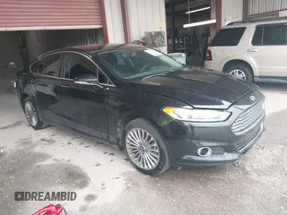 2014 Ford Fusion Titanium with VIN 3FA6P0K99ER235785, listed as a IAAI auction lot 41946638 with 212,939 mi miles and . Bid and sale history available at DreamBid. Image 1.