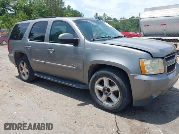 2007 Chevrolet Tahoe LT z VIN 1GNFC130X7R263516, wystawiony jako IAAI lot #42259629 z przebiegiem 215 970 mil mil oraz . Historia ofert i sprzedaży dostępna na DreamBid. Obrazek 1.