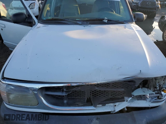 1999 Ford Explorer XLT z VIN 1FMZU32E7XZB32549, wystawiony jako Copart lot #81820544 z przebiegiem 227 686 mil mil oraz Szkoda całkowita • Salvage title. Historia ofert i sprzedaży dostępna na DreamBid. Obrazek 13.