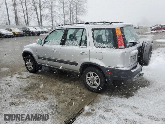 1999 Honda CR-V EX with VIN JHLRD1764XC084847, listed as a Copart auction lot 44084255 with 203,271 mi miles and Clean Title. Bid and sale history available at carsss.com. Image 2.