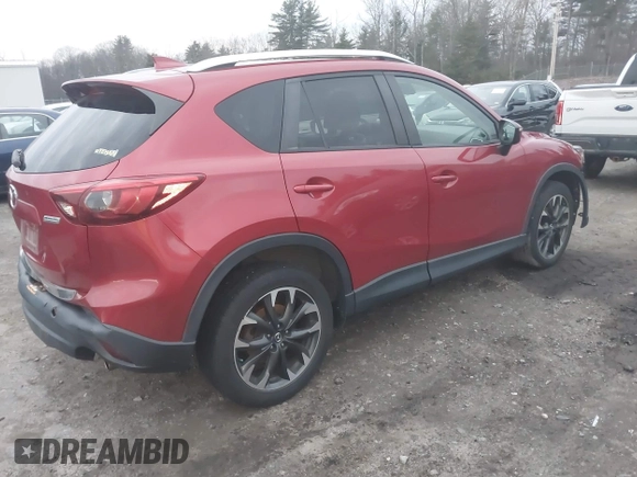 2016 Mazda CX-5 Grand Touring with VIN JM3KE4DY6G0740347, listed as a IAAI auction lot 41101437 with 81,586 mi miles. Bid and sale history available at carsss.com. Image 4.