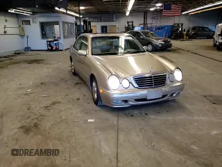 2002 Mercedes-Benz E-Class with VIN WDBJF65J12B485293, listed as a Copart auction lot 77561984 with 140,708 mi miles and Salvage Title. Bid and sale history available at carsss.com. Image 10.