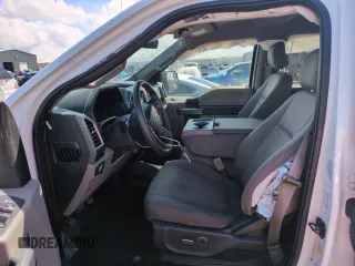 2015 Ford F-150 XLT with VIN 1FTEW1EF5FFB17148, listed as a Copart auction lot 51265215 with 128,011 mi miles and Salvage Title. Bid and sale history available at carsss.com. Image 7.