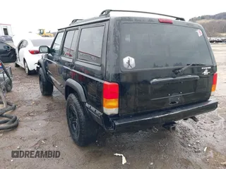 1999 Jeep Cherokee Sport with VIN 1J4FT68S6XL598558, listed as a IAAI auction lot 41549504 with 238,004 mi miles. Bid and sale history available at carsss.com. Image 3.