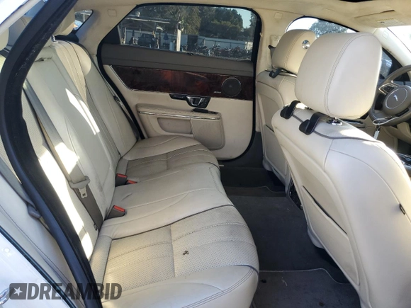 2014 Jaguar XJ with VIN SAJWA2GZ7E8V66626, listed as a Copart auction lot 78824254 with 132,720 mi miles and Salvage Title. Bid and sale history available at carsss.com. Image 10.