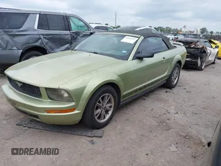 2005 Ford Mustang Deluxe with VIN 1ZVFT84N555249312, listed as a IAAI auction lot 42145721 with 334,417 mi miles. Bid and sale history available at carsss.com. Image 2.