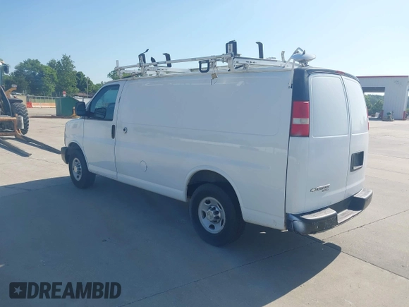 2014 Chevrolet Express Cargo with VIN 1GCWGFCA5E1121007, listed as a IAAI auction lot 42505878 with 178,916 mi miles and . Bid and sale history available at DreamBid. Image 3.