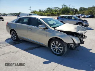 2014 Cadillac XTS with VIN 2G61L5S30E9196697, listed as a Copart auction lot 48574995 with 91,709 mi miles and Salvage Title. Bid and sale history available at carsss.com. Image 4.