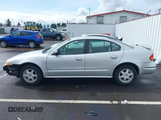 2003 Oldsmobile Alero GL1 z VIN 1G3NL52F93C310114, wystawiony jako IAAI lot #41778264 z przebiegiem Nie podano mil oraz . Historia ofert i sprzedaży dostępna na DreamBid. Obrazek 14.