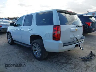 2013 Chevrolet Tahoe Commercial with VIN 1GNLC2E06DR348757, listed as a IAAI auction lot 41711877 with 163,473 mi miles and . Bid and sale history available at DreamBid. Image 3.