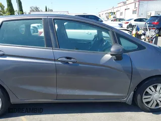 2015 Honda Fit LX with VIN 3HGGK5G54FM731965, listed as a IAAI auction lot 42655355 with 141,205 mi miles and . Bid and sale history available at DreamBid. Image 13.