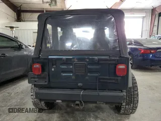 2006 Jeep Wrangler SE with VIN 1J4FA29S36P724699, listed as a Copart auction lot 41764425 with 129,016 mi miles and Salvage Title. Bid and sale history available at carsss.com. Image 6.