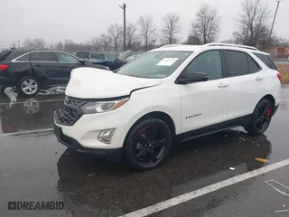 2021 Chevrolet Equinox Premier with VIN 2GNAXNEV7M6112087, listed as a IAAI auction lot 41102702 with 32,995 mi miles. Bid and sale history available at carsss.com. Image 17.