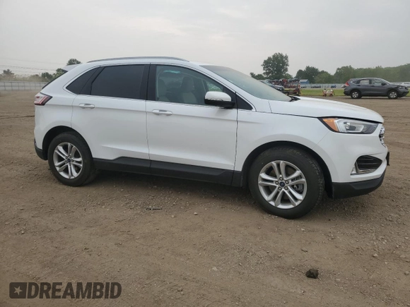 2020 Ford Edge SEL z VIN 2FMPK4J95LBB21392, wystawiony jako Copart lot #60912275 z przebiegiem 82 527 mil mil oraz Szkoda całkowita • Salvage title. Historia ofert i sprzedaży dostępna na DreamBid. Obrazek 4.