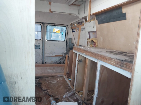 1995 GMC Vandura z VIN 1GTEG25K5SF548518, wystawiony jako IAAI lot #40664471 z przebiegiem 157 506 mil mil oraz . Historia ofert i sprzedaży dostępna na DreamBid. Obrazek 8.