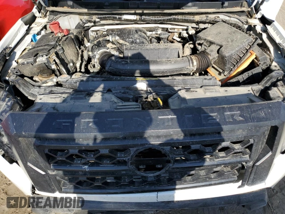 2024 Nissan Frontier Pro-4X with VIN 1N6ED1EK9RN637086, listed as a Copart auction lot 66204205 with 27,713 mi miles and Salvage title. Bid and sale history available at DreamBid. Image 11.