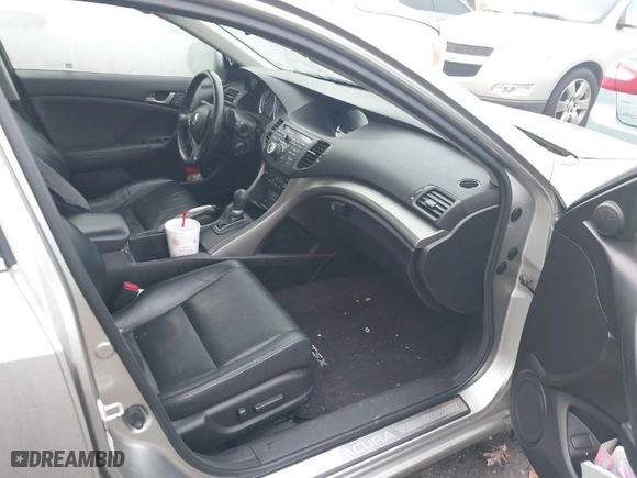 2010 Acura TSX with VIN JH4CU2F62AC011704, listed as a IAAI auction lot 41111267 with 239,403 mi miles. Bid and sale history available at carsss.com. Image 5.