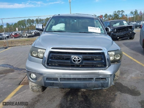 2010 Toyota Tundra 2WD Truck with VIN 5TFRM5F18AX019641, listed as a IAAI auction lot 39478240 with 241,424 mi miles. Bid and sale history available at carsss.com. Image 12.