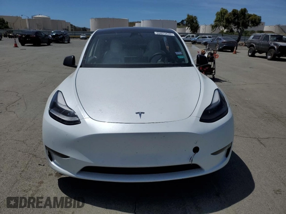 2022 Tesla Model Y Performance z VIN 7SAYGDEF6NF397082, wystawiony jako Copart lot #55823435 z przebiegiem Nie podano mil oraz Szkoda całkowita • Salvage title. Historia ofert i sprzedaży dostępna na DreamBid. Obrazek 5.