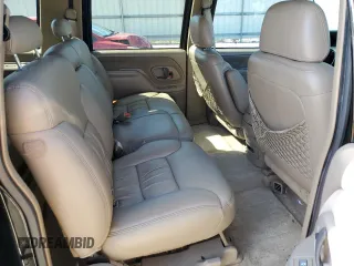 1999 GMC Suburban z VIN 3GKGK26J2XG514835, wystawiony jako Copart lot #47853685 z przebiegiem 124 657 mil mil oraz Tytuł czysty. Historia ofert i sprzedaży dostępna na DreamBid. Obrazek 11.