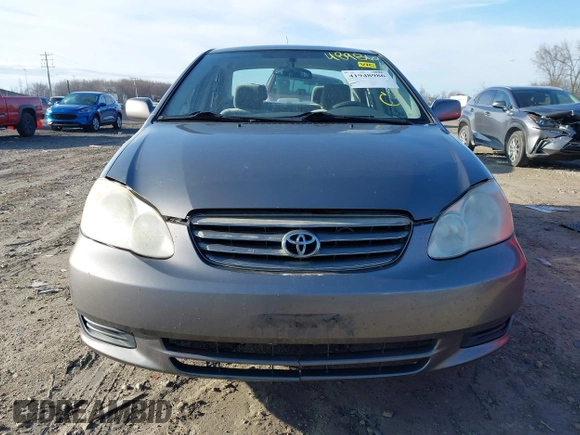 2004 Toyota Corolla CE with VIN 1NXBR38EX4Z265969, listed as a IAAI auction lot 41948986 with 235,816 mi miles. Bid and sale history available at carsss.com. Image 12.