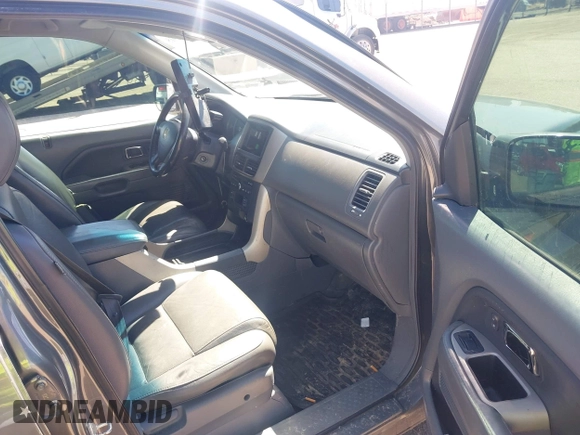 2007 Honda Pilot EX-L with VIN 2HKYF185X7H511879, listed as a IAAI auction lot 41872915 with 232,543 mi miles. Bid and sale history available at carsss.com. Image 5.